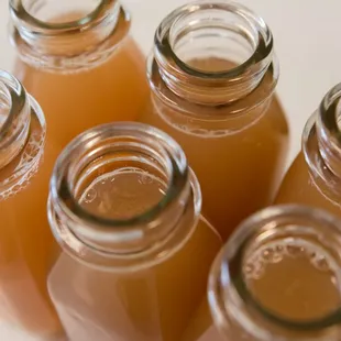 a group of bottles of juice