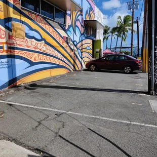 There are five free parking spots on the Auahi Street side of the building
