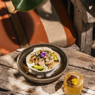 a plate of food on a wooden table