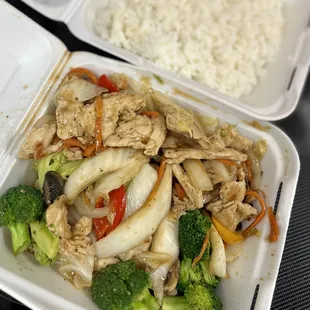 Chicken and mixed veg (broccoli added), served w/ rice.