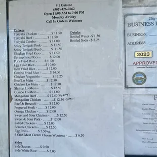 Menu and hours. Cash only!  On the plaza next door to El Encanto.