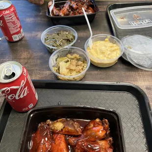 Rib tips, chicken wings, fried cabbage, collards, Mac n cheese, 2 sodas $35