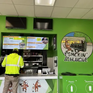 a man standing at the counter