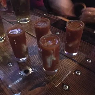 a row of bloody shots