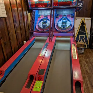 a row of pinball machines