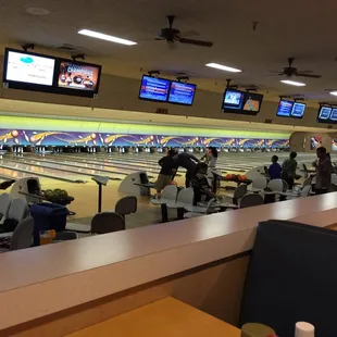 a bowling alley full of people