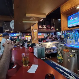 a man drinking a beer