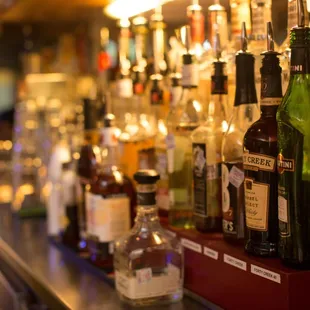 a row of liquor bottles