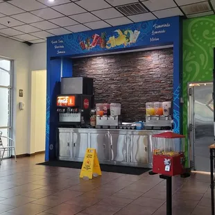 Drink station in the middle. Patio far left. Counter far right.