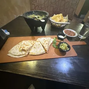 Chicken Quesadilla, fresh Guacamole, chips and salsa