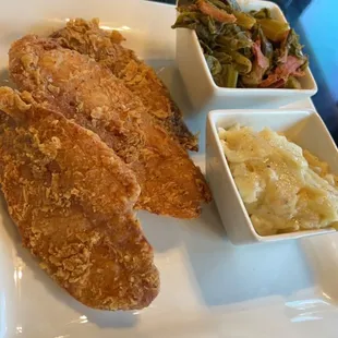 Catfish (brunch menu item) Two Southern Fried Catfish Fillets with a Savory Sides (greens &amp; mashed potatoes)