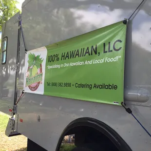  a food truck parked in a field
