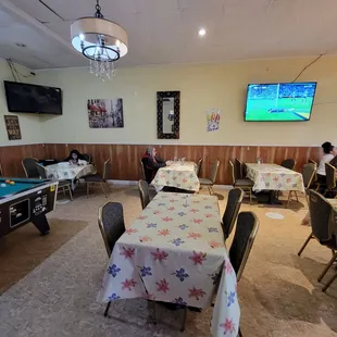 Pool table on the left. Our table is straight ahead against the wall.