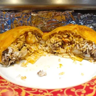 Shrimp and Scallop Burrito cut in half so you can see the interior.