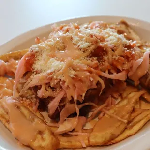 Pollo hondureno con tajada(fried chicken with green plantains?