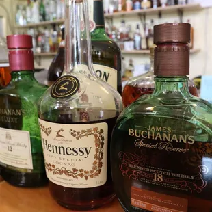 bottles of alcohol on a bar