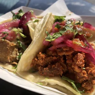 Al Pastor (right) and Carnitas (left. Duh.) tacos. Both a bit dry.  Not bad. Not fabulous. Solid 3 Stars.