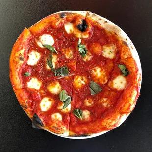 Margherita. Pretty good but honestly they could have added more cheese even for an authentic pie.