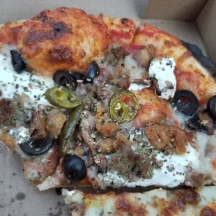 a slice of pizza in a box