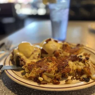 1/2 &amp; 1/2 Corned Beef &amp; Louisiana Sausage Benedicts w Potatoes