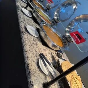 a buffet with a variety of food items