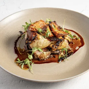 Grilled Lamb Belly w/
Charred Cabbage, Pomegranate Tamarind Gastrique, Curried Yams, Cilantro