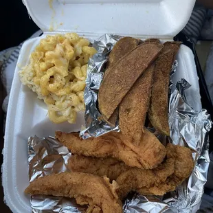 Chicken tenders, fries and Mac and cheese