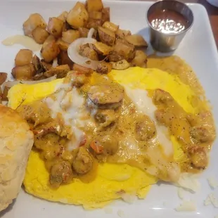 Pure heavenly crawfish and sausage omlete! AMAZING!