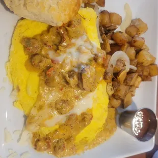 Crawfish and Sausage Omlete!! Seasonal and lord it is to die for!!