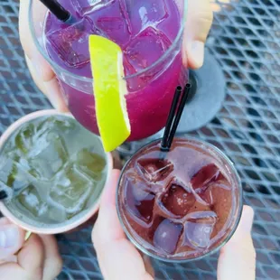 a close up of two cocktails