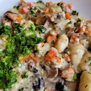 Gnocchi with mushrooms,  carrots, and pesto