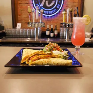 a plate of food and a drink