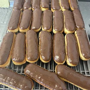 chocolate frosted donuts on a cooling rack