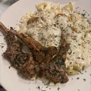 Lamb chops with shrimp pasta.