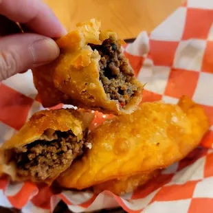 Empanadas! You can get one chicken and one beef. I think $8 total for 2