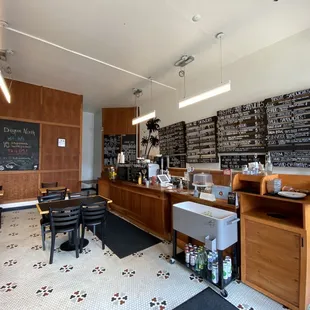 a coffee shop with tables and chairs