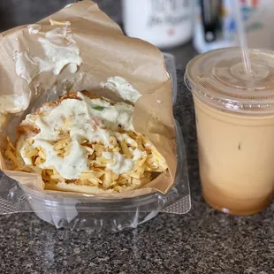 a sandwich and a drink on a counter