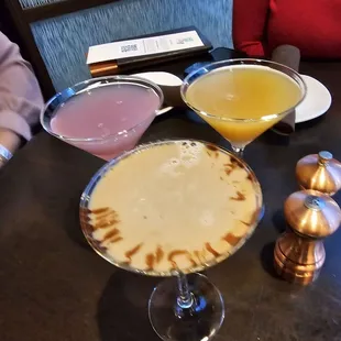 Double expresso martini,  pink vodka something,  mango fruit something