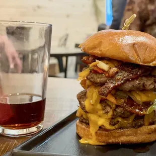 a burger and a glass of beer