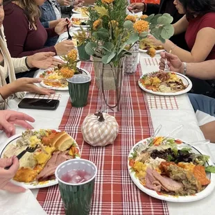 a group of people eating a meal