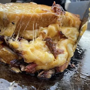 a close up of a grilled cheese sandwich