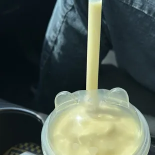 Mango smoothie. Cute lids. Just