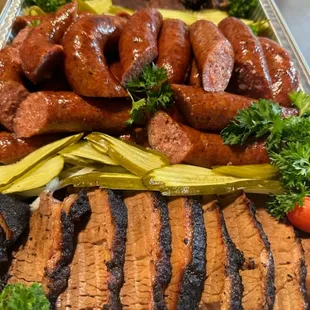 Birthday party platter brisket, sausage
And ribs
