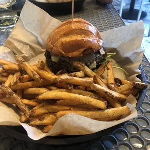 Mushroom, spinach, Swiss burger with homemade cut fries.