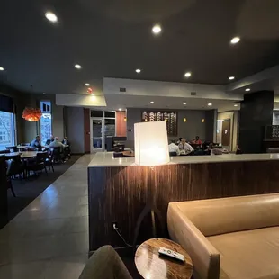 a view of a bar and lounge area