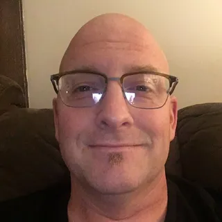 Travis W.