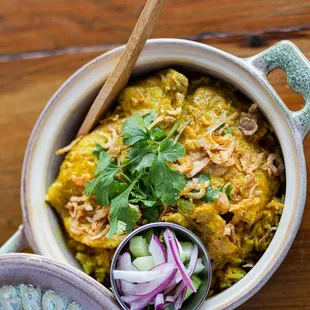 Our Signature called Tumeric Chicken Claypot Rice. Photo by Kristen Murakoshi for SF Chronicles.