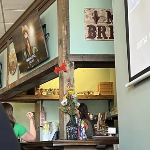 a woman sitting at the bar