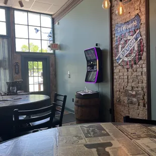 an arcade machine in the background