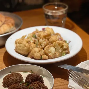 plates of food on a wooden table